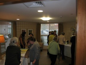 Seniors attend an event showcasing educational and lifestyle opportunities at North Hill retirement community in Needham, MA.