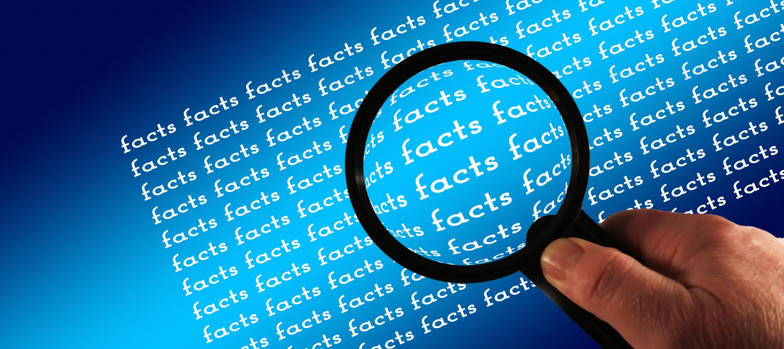 Magnifying glass with text that says "Facts"