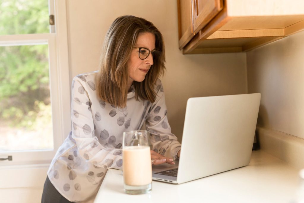 senior woman searching on computer