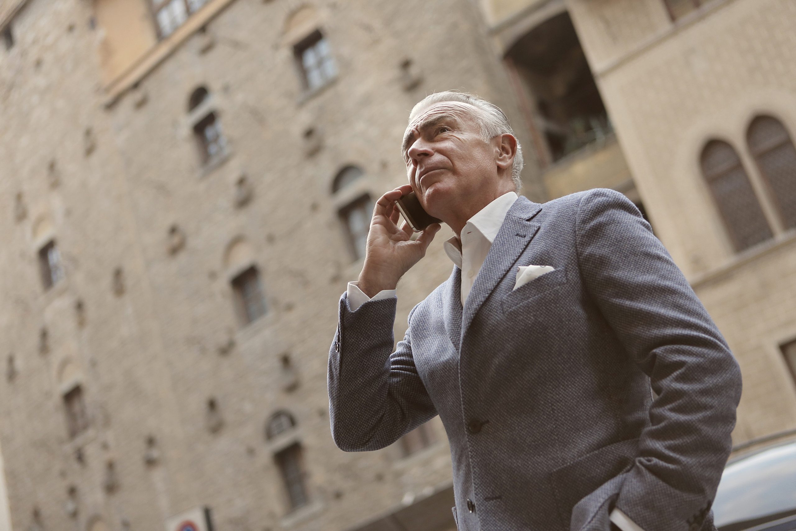 business man holding cell phone